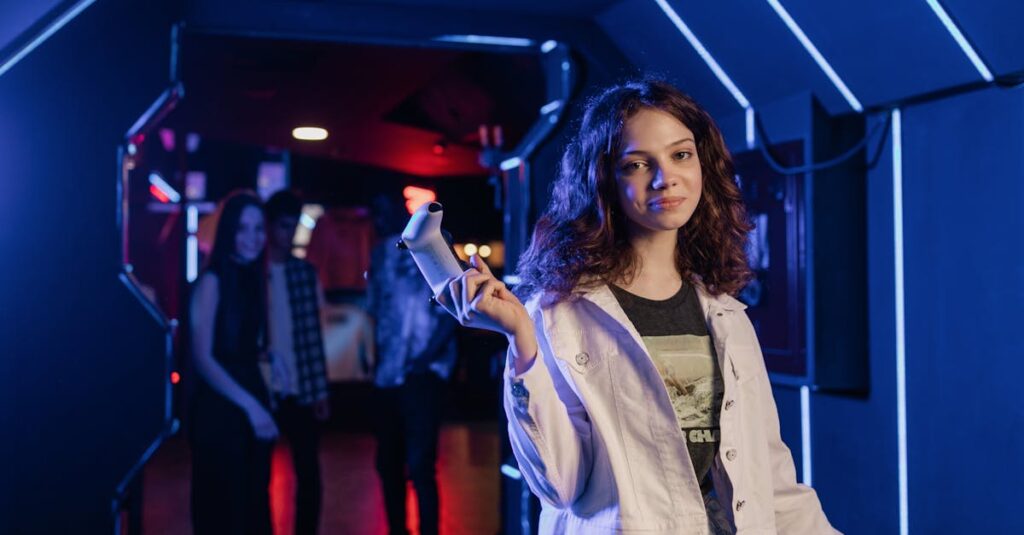 pexels photo 7862447 7862447 Young girl immersed in a gaming environment, holding a game controller in a neon-lit arcade.